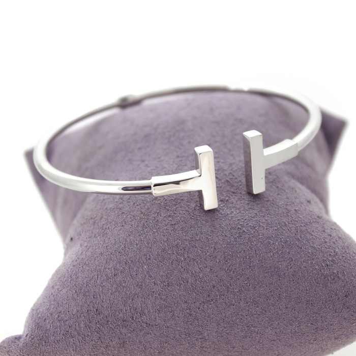 Esclave_Witgoud_18K_Tweedehands_95540-2406_Juwelier_Clem_Vercammen-6.jpg