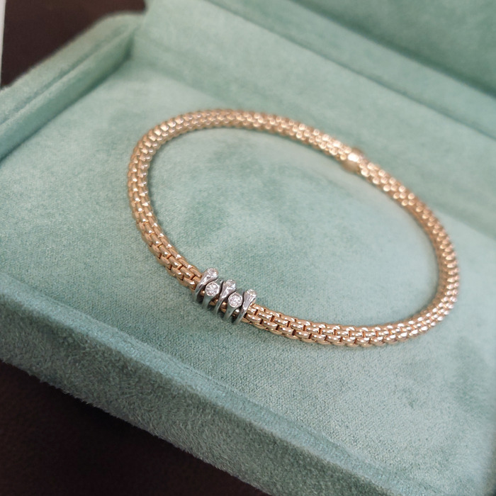 Fope_Flexit_Prima_Armband_74608BX_BB_R_XBX_Briljanten_Bicolor_Wit_En_Geelgoud_18K_Tweedehands_97316-2462_Juwelier_Clem_Vercammen-9.jpg