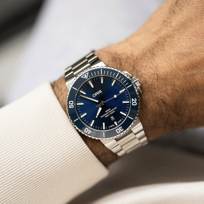263658_01_Oris_Aquis_Date_01733-7787-4135-07-8-23-04PEB_Juwelier_Clem_Vercammen_6.jpg