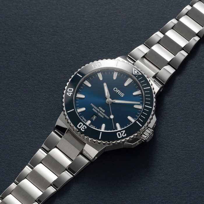 263658_01_Oris_Aquis_Date_01733-7787-4135-07-8-23-04PEB_Juwelier_Clem_Vercammen_2.jpg